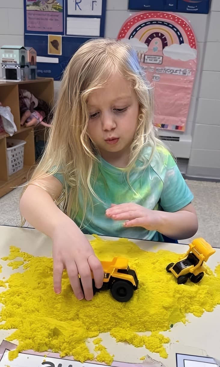 A child exploring at Rainbow Years